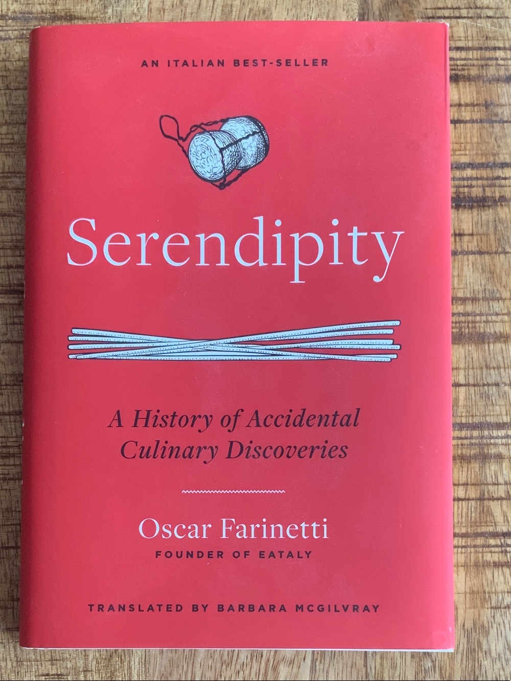 Serendipity by Oscar Farinetti - Red Hardcover
